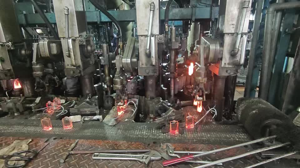 Glass bottles on conveyor belt