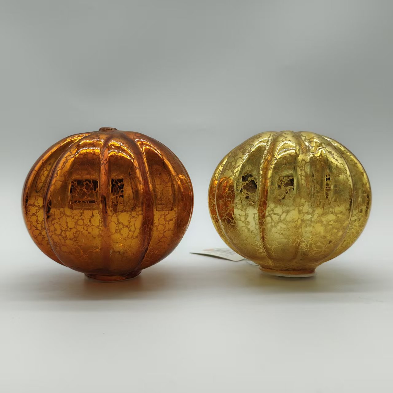 Large pumpkin-shaped glass decor piece